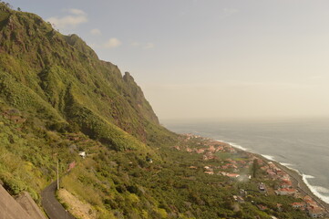 Fototapeta premium Hiking along the coast, by the waterfalls and in the green levadas of Madeira Island in Portugal