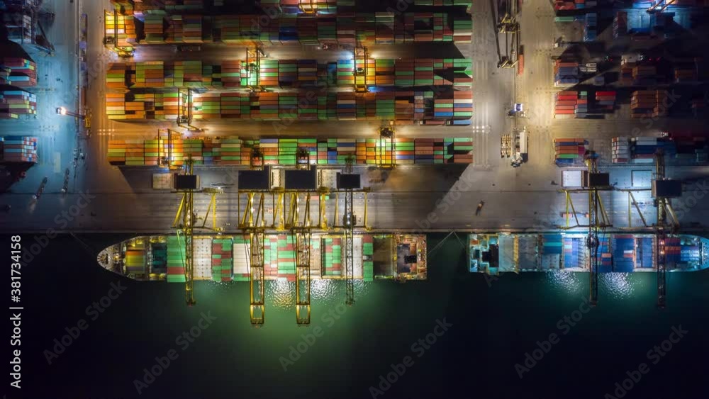 Sticker Time lapse Container , container ship in export and import business and logistics. Shipping cargo to harbor by crane. Water transport International. Aerial view and top view.