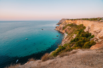 Fototapeta na wymiar Sunset on Cape Fiolent, panorama of the black sea with azure water, Crimea