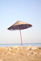 wicker umbrella on the beach
