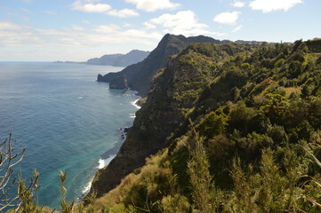Obraz premium Hiking along the coast, in the mountains and along the levadas of Madeira Island in Portugal