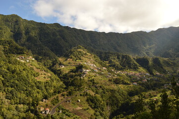 Obraz premium Hiking along the coast, in the mountains and along the levadas of Madeira Island in Portugal