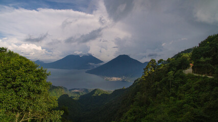 mountains and clouds on the ocean