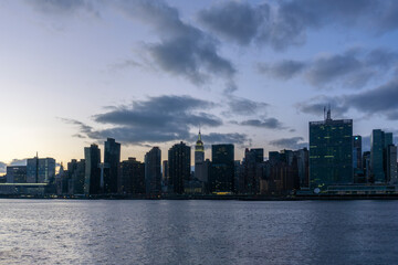 Fototapeta na wymiar An aerial view of NYC skyline. Skyscrapers of midtown in Manhattan along East river