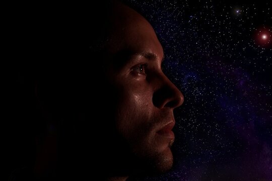 Close-up Of Man Face Against Star Field