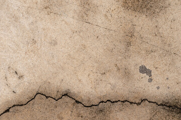 Blank concrete gray rough wall for background. Beautiful grey wall with cracks and dirty.