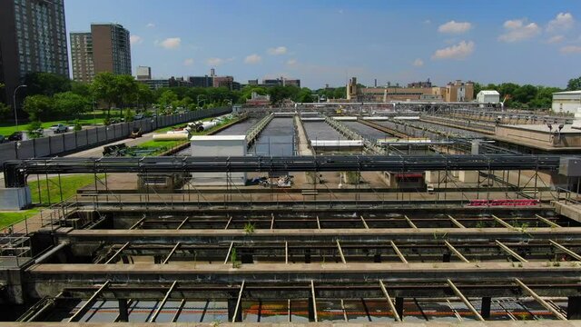 Low Flyover Shot of an Industrial Waste Water Plant in Brooklyn