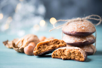 Nuremberg gingerbread with nuts on a blue and grey background, empty space for test, traditional german sweetness for christmas kown as Lebkuchen