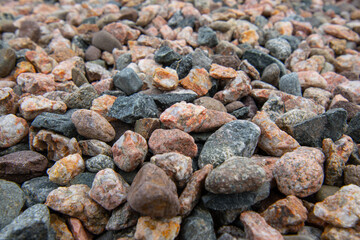 Red granite chippings texture, background