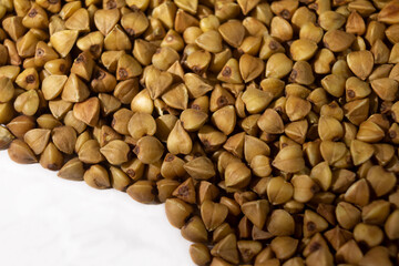 Buckwheat close-up on a white background, texture