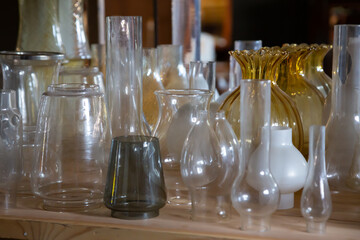 Old fasioned glass vessels on the shelf