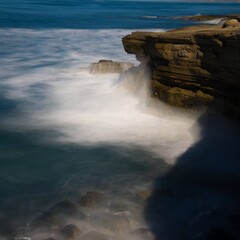 waves crashing on rocks