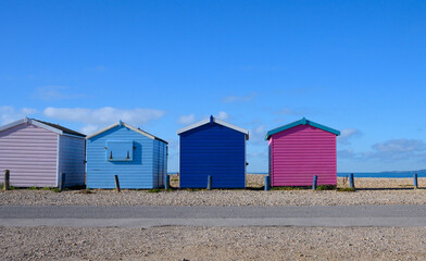 Naklejka premium Beach Huts on English South coast in summer