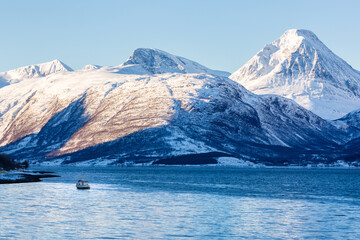 Winter landscape with mountains and fjord