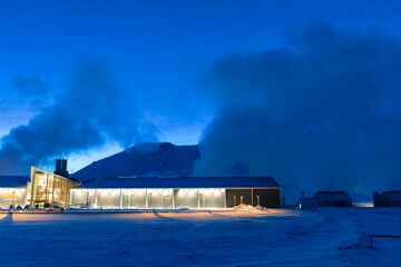 Night view. Thermal power plant building at a hot spring. Icelandic industry