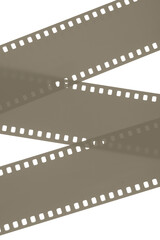 Obraz premium Photographic film background. 35mm negative film tapes on a white background.