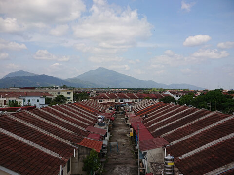A perspective view of a significant residential housing area and the mountains beyond