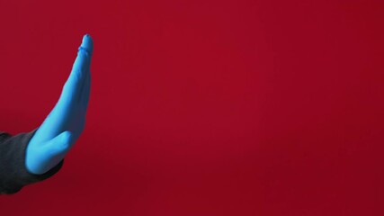 Greeting hygiene. COVID-19 outbreak. Physical contact risk. Disgusted man in blue protective gloves avoid handshake with female bare hand spraying with antiseptic isolated on red loop set of 4.