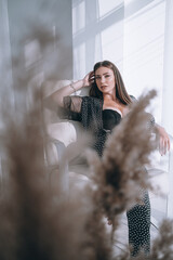 young beautiful brunette boudoir shooting model plus