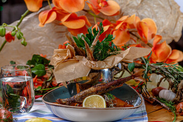 Fototapeta na wymiar Fish in batter deep-fried lie in a bucket in a restaurant.