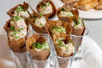 Luxurious catering table. Rolls with filling and croutons.