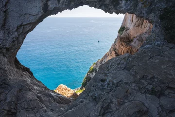 Fotobehang Grotta dei Falsari, Robber's Cave, Varigotti, Liguria, Italy © EyesTravelling
