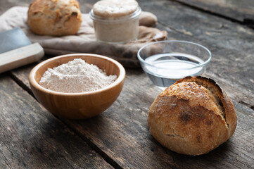 Still life of home made sourdough bread and ingredients