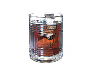 Crystal glass of whiskey with ice