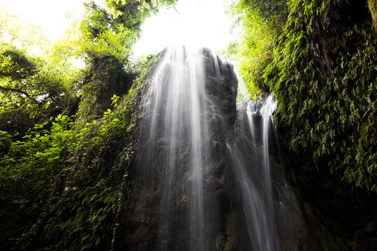 Beautiful secret waterfall in Turkey, Gizlikent Waterfall, water gushing through the bushes