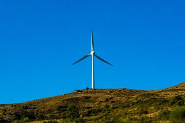 Fototapeta na wymiar wind turbine in the wind