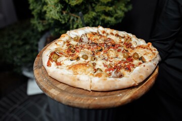 Pizza on wooden table top view. Fast food. Post blog social media. with copy space. Pizza ready to eat