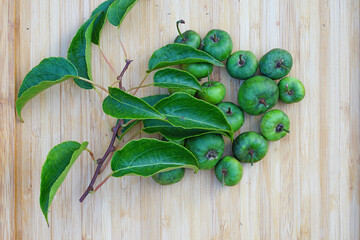 Green baby kiwi berries 