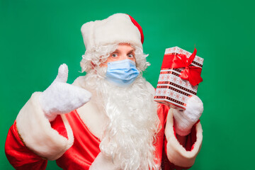 Coronavirus. Convid-19. Santa Claus wears a face mask to prevent CORONAVIRUS.