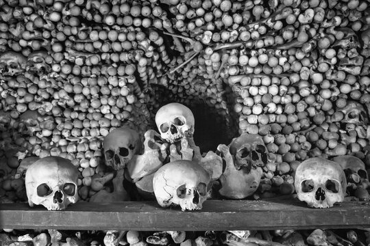 Kostnice Church in Kutna Hora with Ossuary interior decoration from human bones and skulls, Czech republic, in black-and-white color