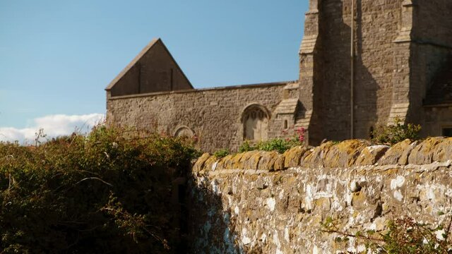 Close-up view of the stunning Old Church of St Nicholas at Uphill, Somerset, England, UK dating from around 1080