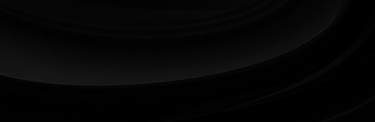 Black gray satin dark fabric texture luxurious shiny that is abstract silk cloth panorama background with patterns soft waves blur beautiful.