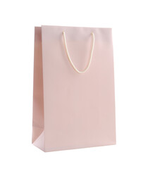 Pink paper shopping bag isolated on white