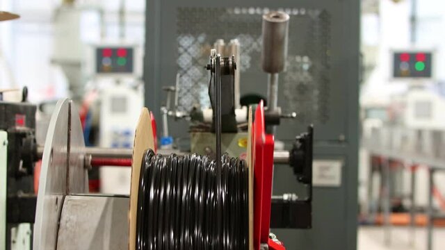 Industrial production - production of black rubber gaskets - winding on a roll