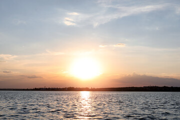 Fototapeta premium Picturesque view of beautiful sunrise on riverside. Morning sky