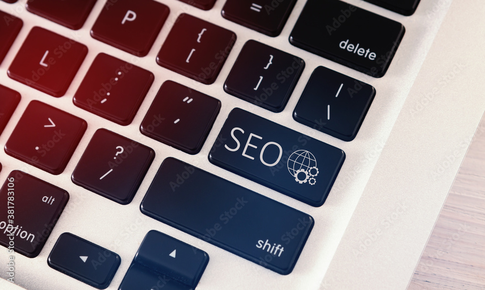 Poster Closeup Of Computer Keyboard With Keyword Seo, White Background