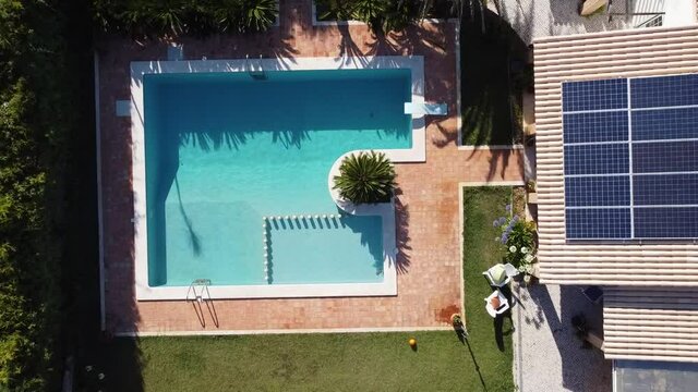 Aerial View of a Luxury Swimming Pool in Summer