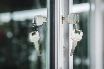 key in house door. Real estate agent offer house, property insurance and security, affordable housing concepts