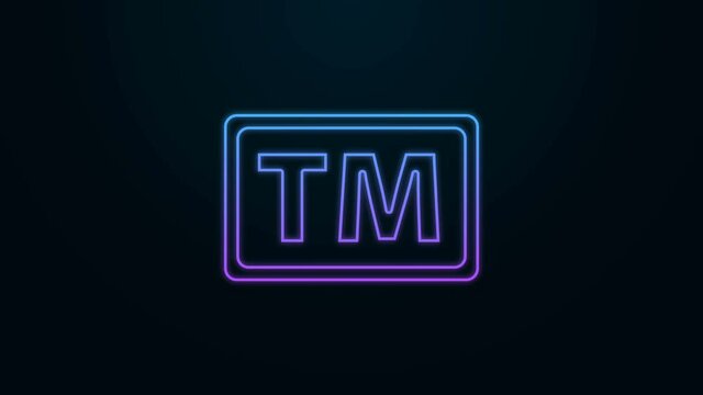 Glowing neon line Trademark icon isolated on black background. Abbreviation of TM. 4K Video motion graphic animation