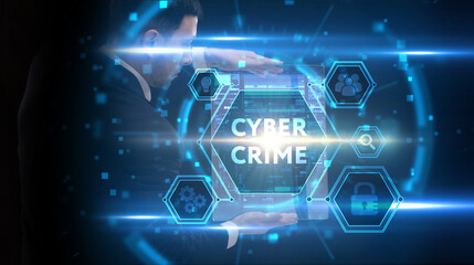 Naklejka premium Business, Technology, Internet and network concept. Young businessman working on a virtual screen of the future and sees the inscription: Cyber crime
