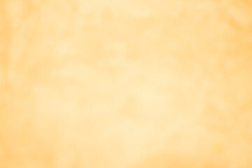 Bright golden yellow background with abstract pattern