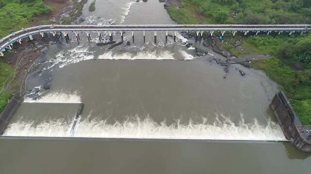 Pisa Dam Near Klayan,Mahrashtra
Ths particular Drone Shot Is a Tilt Reveal Showcasing the view from dam to the scenery in the surroundings