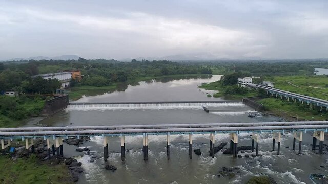 Wide Drone Shot Of Pisa Dam , Kalyan 
Pisa Dam Is in the Outskirts of Kalyan & Bhiwandi, Maharashtra 
This Is a  wide shot Of the Dam along with Scenery
