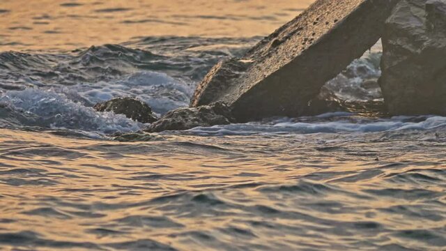 sea wave splash in concrete pillar 4k