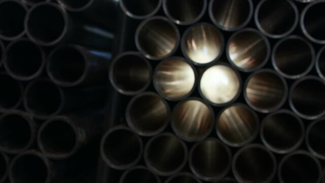 Bright yellowish light comes through little black plastic tubes