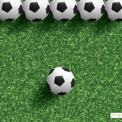 Plakat Soccer football ball on green grass of soccer field background. Vector.